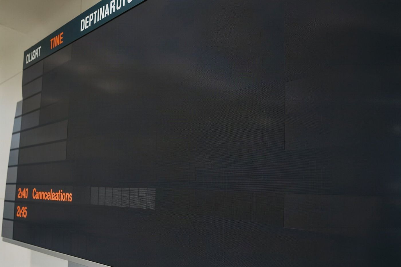 A departures board at an airport