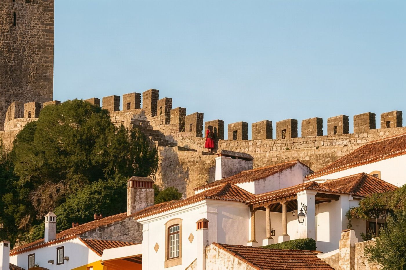 The walls of Óbidos, a stop on the road north